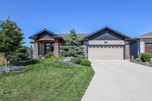 Situated on perhaps the best lot on Rose Lake Court, the 2,112 sq. ft. walk-out bungalow was designed to take advantage of its surroundings.