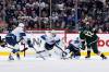 Fred Greenslade / The Canadian Press 
                                Minnesota Wild&rsquo;s Sam Steel takes a shot on Winnipeg Jets goaltender Connor Hellebuyck Tuesday night at Canada Life Centre.