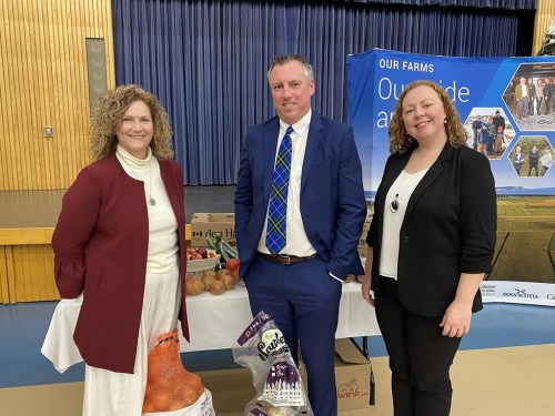 Northwood CEO Janet Simm, left to right, Nova Scotia Agriculture Minister Greg Morrow and Letitia Rowley of Gordon Food Services pose for a photo at Northwood long term care facility, in Halifax, Friday, Dec. 9, 2022. Morrow says Northwood is getting up to $25,000 from a $250,000 program to help boost its use of more locally grown and produced food products, that will eventually spread to other nursing homes as well as public schools and hospitals. THE CANADIAN PRESS/Keith Doucette