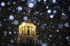 Snow falls during a blizzard warning, Wednesday, Dec. 21, 2022, at the Old Capitol Building in Iowa City, Iowa. (Joseph Cress/Iowa City Press-Citizen via AP)