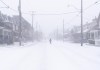 A man crosses a road during a snowstorm in Toronto on Friday, December, 23, 2022. A winter storm warning is in place for most of southern Ontario. THE CANADIAN PRESS/Arlyn McAdorey