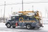 A Hydro Quebec truck is shown in an area without power in Montreal, Saturday, Dec. 24, 2022, following a winter storm in the region. Utility crews in Ontario, Quebec and New Brunswick are still working to restore electricity to thousands of customers who have been in the dark for days after last week's fierce winter storms knocked out their power. THE CANADIAN PRESS/Graham Hughes