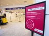 A sign reminds arriving passengers to quarantine against COVID-19 at Trudeau Airport in Montreal, Friday, Feb. 19, 2021.&nbsp; THE CANADIAN PRESS/Ryan Remiorz