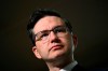 Conservative Leader Pierre Poilievre listens to a question during a media availability on Parliament Hill in Ottawa, Friday, Dec. 30, 2022. THE CANADIAN PRESS/Justin Tang