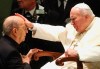 FILE - Pope John Paul II gives his blessing to Father Marcial Maciel, founder of the Legionaries of Christ, during a special audience at the Vatican on Nov. 30, 2004. An internal investigation would later reveal that Father Maciel was a notorious pedophile. Pope Benedict XVI removed Maciel from active ministry and took over the Legionaries of Christ. Benedict rarely got credit for having turned the Vatican around on clergy sexual abuse, but as cardinal and pope, he pushed through revolutionary changes to church law to make it easier to defrock predator priests. (AP Photo/Plinio Lepri, File)