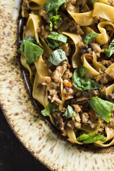 This image released by Milk Street shows a recipe for Pasta with Sausage and Porcini Mushroom Ragu. (Milk Street via AP)