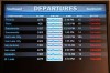 FILE - Canceled Southwest Airlines flights are displayed in red on the departures monitor at the Southwest terminal at the Los Angeles International Airport, Dec. 27, 2022. With its flights now running on a roughly normal schedule, Southwest Airlines is turning its attention to luring back customers and repairing damage to a reputation for service after canceling 15,000 flights around Christmas. The disruptions started with a winter storm and snowballed when Southwest's ancient crew-scheduling technology failed. (AP Photo/Damian Dovarganes, File)