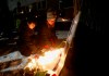 Kirstin Witwicki, right, a cousin of Morgan Harris, joined the family and friends of three slain women at a vigil in Winnipeg, Thursday, Dec. 1, 2022. A landfill has reopened to the public following weeks of conversations between the City of Winnipeg and demonstrators who set up blockades calling for a search of the area for Indigenous women believed to be victims of an alleged serial killer. THE CANADIAN PRESS/John Woods