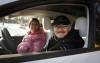 JESSICA LEE / WINNIPEG FREE PRESS
                                Robert Elms (right), past president of the Manitoba Electric Vehicle Association and Lois Bergen, in a Tesla at Assiniboine Park.