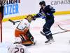 THE CANADIAN PRESS/Fred Greenslade
                                Winnipeg Jets’ Sam Gagner reaches for bouncing puck behind Anaheim Ducks goaltender Anthony Stolarz during the third period.