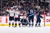 FRED GREENSLADE / THE CANADIAN PRESS
                                Washington Capitals&rsquo; Evgeny Kuznetsov (92) celebrates his goal against the Winnipeg Jets goaltender Connor Hellebuyck (37) with Conor Sheary (73) during second period NHL action in Winnipeg, Sunday, Dec. 11, 2022.