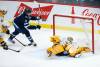 Adam Lowry celebrates as Kyle Connor&rsquo;s (not shown) shot sneaks through the pads of Nashville Predators goaltender Juuse Saros for the winning goal in overtime on Thursday. (John Woods / The Canadian Press)