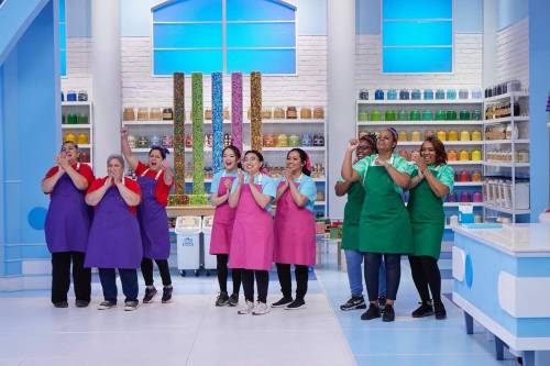 The Sugar Blooms and Cakes team (centre) beat out two American teams on an episode of the Food Network Canada’s The Big Bake: Holiday, which aired on Dec. 4. (Food Network Canada)