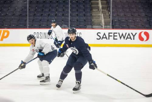 JESSICA LEE / WINNIPEG FREE PRESS
                                Kristian Reichel (right) played 13 games last season before his foot was broken in a game against Calgary. He finally worked his way back into the Jets’ lineup New Year’s Eve against Edmonton.