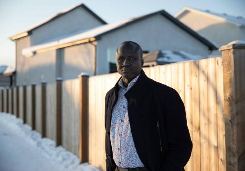 JESSICA LEE / WINNIPEG FREE PRESS
                                Immigration Partnership Winnipeg co-ordinator Reuben Garang near his home in Transcona.