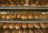 JASON HALSTEAD / WINNIPEG FREE PRESS FILES
                                Unsliced loaves of rye bread cool at KUB Bakery; the lighter, milder-tasting bread is unique to Winnipeg.