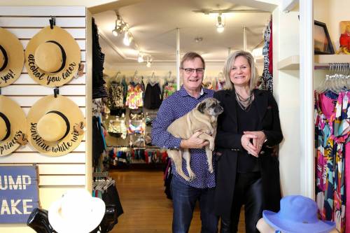 RUTH BONNEVILLE / WINNIPEG FREE PRESS
                                Peepers Feature on local business celebrating 40years in Biz. Pics of Peepers Swimwear owners Phil Marriott/Donna Anderson (they’re a couple) with their Lilly, their dog, in store. What: This is for a Sunday Special feature on Peepers, a specialty store on Corydon that just celebrated its 40th year in biz. Phil & Donna bought the store, which stocks the city’s largest supply of swimwear, 12 years ago. People are always surprised to learn January is the shop’s busiest month of the year, what with so many Manitobans escaping the cold. COVID didn’t help much, but now that things are pretty much back to normal, travel-wise, things are hopping again. Sunday Special two-page virtual spread Reporter: Dave Sanderson Jan 5th, 2023