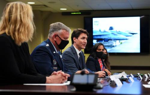 Sean Kilpatrick / THE CANADIAN PRESS FILES
                                Prime Minister Justin Trudeau, centre, takes part in a briefing at North American Aerospace Defense Command and United States Northern Command Headquarters in Colorado.