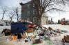 MIKE DEAL / WINNIPEG FREE PRESS
                                Empty food containers, rotten groceries, beer cans and unidentifiable detritus has overfilled and spilled out of the large trash bin behind 270 St. John’s Ave., with garbage trailing into the back alley and nearby street.