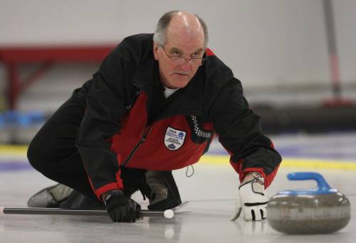 TIM SMITH / THE BRANDON SUN FILES
                                Ray Orr of Minnedosa throws a rock during the Provincial Masters Men’s Curling Final against Bob Turner’s rink from Thistle at the Minnedosa Curling Club in 2009.