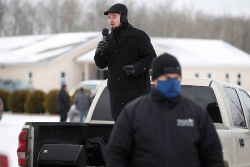 JOHN WOODS / WINNIPEG FREE PRESS FILES
                                Church of God Restoration pastor Tobias Tissen speaks from a truck as RCMP officers and Manitoba Justice officials blocked the entrance to The City of God Church in Sarto, just south of Steinbach, to enforce Manitoba Health COVID-19 orders Sunday, November 29, 2020. Reporter: Abas