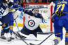 Connor Hellebuyck made 39 saves against the NHL’s highest-scoring team on Thursday. (Jeffrey T. Barnes / The Associated Press)