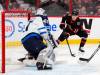 SEAN KILPATRICK / THE CANADIAN PRESS
                                Ottawa Senators left wing Tim Stutzle (18) skates the puck out of the corner on Winnipeg Jets goaltender Connor Hellebuyck during second period NHL hockey action in Ottawa on Saturday, Jan. 21, 2023.