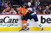 DEREK HAMILTON / THE ASSOCIATED PRESS
                                Philadelphia Flyers winger Wade Allison (left) plays the puck against Winnipeg Jets forward Kevin Stenlund Sunday night in Philly.