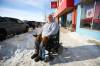 If the city cleared sidewalks down to the pavement, getting around independently would be much easier for Tom Jones, he says. (Mike Deal / Winnipeg Free Press)