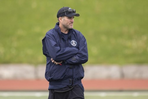 Toronto Argonauts head coach Ryan Dinwiddie watches a drill during CFL training camp at Alumni Stadium in Guelph, Ont., Friday, May 20, 2022. THE CANADIAN PRESS/Nick Iwanyshyn