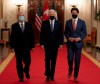 Canadian Prime Minister Justin Trudeau, United States President Joe Biden and Mexican President Andres Manuel Lopez Obrador walk to a meeting at the North American Leaders’ Summit in Washington, D.C., on November 18, 2021. The trio will meet again this week as the so-called 