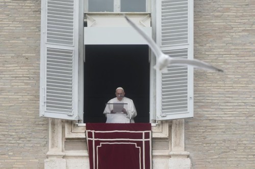 Pope Francis delivers the Angelus noon prayer in St. Peter's Square, at the Vatican, Sunday, Jan. 8, 2023. (AP Photo/Gregorio Borgia)