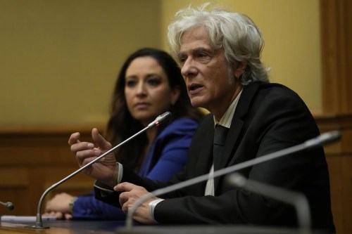 FILE - Pietro Orlandi, right, brother of Manuela, a 15-year-old daughter of a Vatican employee disappeared in 1983, is flanked by his lawyer Laura Sgro, left, as he attends a press conference on the establishing of a parliamentary investigative commission on Manuela Orlandi and other cold cases, in Rome, Dec. 20, 2022. The Vatican has reopened the investigation into the 1983 disappearance of the 15-year-old daughter of a Vatican employee, months after a new Netflix documentary purported to shed new light on the case and weeks after her family asked the Italian Parliament to take up the cause. On Monday, Jan. 9, 2023, Pietro Orlandi called the prosecutor's decision a “positive step” that the Vatican has apparently changed its mind, gotten over its resistance and now will go over the case from the start. (AP Photo/Alessandra Tarantino, File)