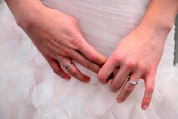 A model wears a ring at a bridal shop in Toronto on Monday December 3, 2012. So many Canadian couples are seeking ring-specific coverage or reviewing home insurance policies to protect their new rock on their way to the altar. THE CANADIAN PRESS/Frank Gunn