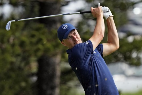 Jordan Spieth plays his shot from the second tee during the final round of the Tournament of Champions golf event, Sunday, Jan. 8, 2023, at Kapalua Plantation Course in Kapalua, Hawaii. (AP Photo/Matt York)