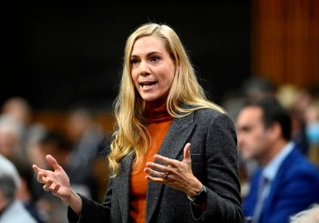 Minister of Sport Pascale St-Onge rises during Question Period in the House of Commons on Parliament Hill in Ottawa, Thursday, Dec. 8, 2022. Canada's sports minister defended the low intake of complaints by the new sports integrity commissioner and urged the country's sport bodies to sign onto the abuse-free sport program. THE CANADIAN PRESS/Justin Tang