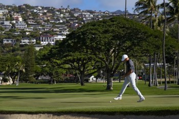 Jordan Spieth watches his putt miss the cup on the 16th green during the first round of the Sony Open golf tournament, Thursday, Jan. 12, 2023, at Waialae Country Club in Honolulu. (AP Photo/Matt York)