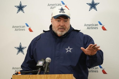 Dallas Cowboys head coach Mike McCarthy speaking to members of media after an NFL football game against the Washington Commanders, Sunday, Jan. 8, 2023, in Landover, Md. Washington won 26-6. (AP Photo/Patrick Semansky)