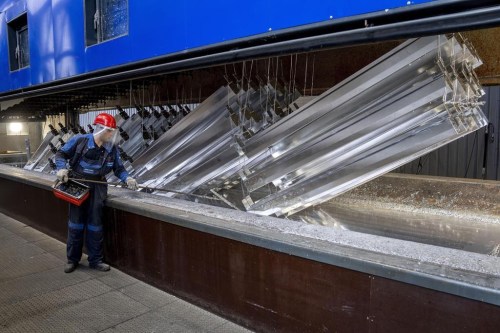 FILE -- A worker moves metal pieces that are hot-dip galvanized in the Zinkpower galvanizing company in Meckenheim, Germany, Thursday, Aug. 18, 2022. Germany's national statistics office says that the country's economy appears to have stagnated in the fourth quarter. It said Friday that Europe’s biggest economy managed full-year growth of 1.9% — slowing somewhat from 2021 as the impact of Russia’s war in Ukraine weighed on its performance. (AP Photo/Michael Probst,file)