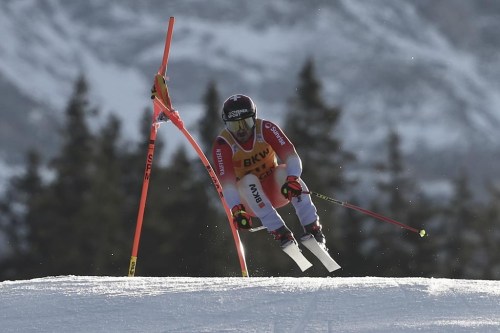 Switzerland's Loic Meillard speeds down the course during an alpine ski, men's World Cup super G race, in Wengen, Switzerland, Friday, Jan. 13, 2023. (AP Photo/Gabriele Facciotti)