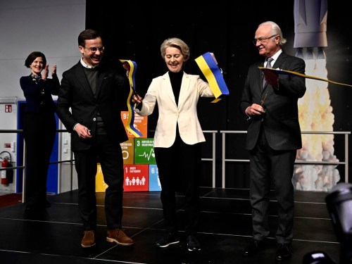 From left, Sweden's Prime Minister Ulf Kristersson, European Commission President Ursula von der Leyen and Sweden's King Carl Gustaf at the inauguration of Esrange's new satellite launch ramp, Spaceport Esrange outside Kiruna Sweden, Friday Jan. 13, 2023. The European Commission and the Swedish government met in Sweden's northernmost city Kiruna and nearby Jukkasjarvi on Jan. 12-13, the first meeting since Swedish took over the EU presidency on Jan. 1, 2023. (Jonas Ekströme/TT News Agency via AP)