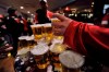 Canada has adopted new guidance on low-risk alcohol consumption, drastically slashing the amount of booze that was considered safe in 2011. A report by the Canadian Centre on Substance Use and Addiction says the latest evidence shows alcohol is a carcinogen associated with seven types of cancer, mostly of the breast and colon, as well as heart and liver disease, dementia and lower respiratory infections. Hockey fans load up on beer at a bar in Edmonton on Dec. 31, 2011. THE CANADIAN PRESS/Nathan Denette
