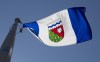 The Northwest Territories is considering whether to end seasonal time changes after a survey suggested there's interest in the move. The Northwest Territories flag flies on a flag pole in Ottawa, Monday July 6, 2020. THE CANADIAN PRESS/Adrian Wyld