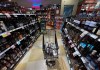 A person's purchases are seen in a shopping cart at a government-run BC Liquor Store in Vancouver, on Friday, August 19, 2022. Politicians in charge of provincial liquor corporations aren't hurrying to adopt or promote updated guidelines that advise a steep drop in Canadian drinking habits. THE CANADIAN PRESS/Darryl Dyck