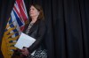 Federal Health Minister Jane Philpott listens after she and British Columbia Health Minister Terry Lake announced the province and the federal government had reached an agreement on health care funding, during a news conference in Richmond, B.C., on Friday February 17, 2017. Former health minister Philpott says the targeted funding agreements Ottawa signed with the provinces six years ago have not provided the 