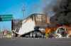 A truck burns on a street in Culiacan, Sinaloa state, Thursday, Jan. 5, 2023. (AP Photo/Martin Urista)