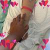 SUPPLIED
                                Naturelle Cook holds the hand of her mother Melissa Cook shortly before her life support was removed.