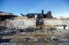 MIKE DEAL / WINNIPEG FREE PRESS
                                The blaze overtook Surplus Direct Liquidation, Lord Selkirk Furniture and Top Pro Roofing Ltd. &mdash; 843, 835 and 847 Main St., respectively.