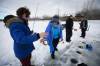 JOHN WOODS / WINNIPEG FREE PRESS
Roselle Turenne (second from left) conducts workshops, primarily for women, where she teaches the ins and outs of ice-fishing.