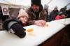 JOHN WOODS / WINNIPEG FREE PRESS
Macy Bell and dad Jamie roll maple taffy on Sunday.